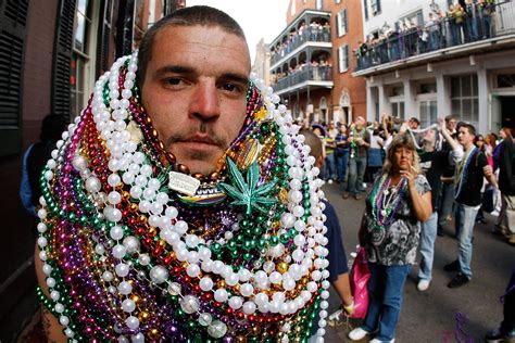 The Destructive Life Of A Mardi Gras Bead Observer