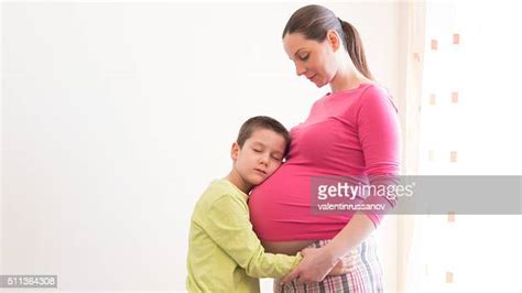belly kissing photos and premium high res pictures getty images