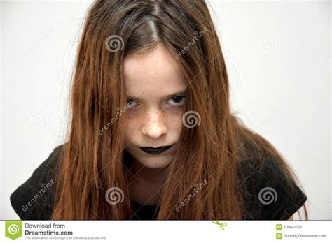Teenage Girl In Gothic Style Looking Very Angry Stock