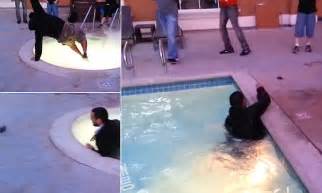 man tries to save iphone from hot tub but throws it in a swimming pool daily mail online