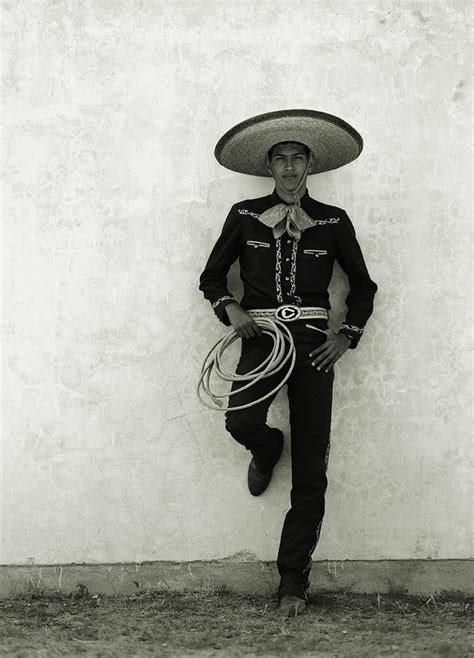 mexican cowboy wearing hat  holding photograph  terry vine fine art america