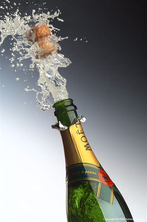 bottle  champagne popping  cork  splashing