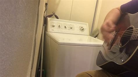 musician uses washing machine as a backing to guitar solo daily mail