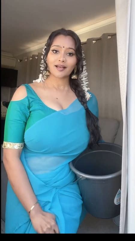 busty aunty huge boobs in blue saree