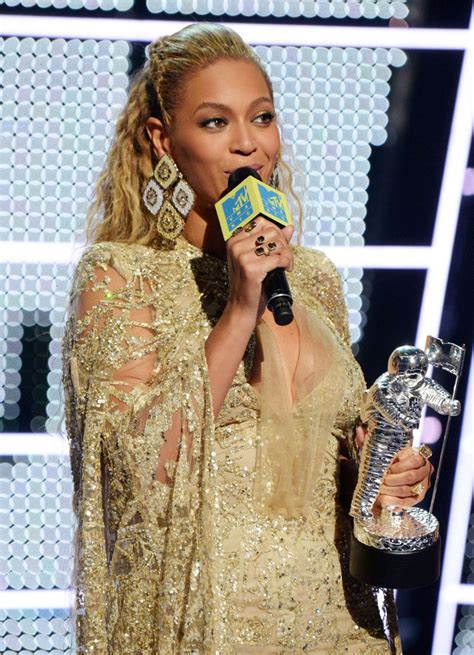 beyoncé accepts an award onstage during the 2016 mtv video music awards