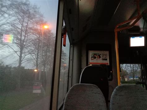 bus window reflects  screen  rainbow colours rmildlyinteresting