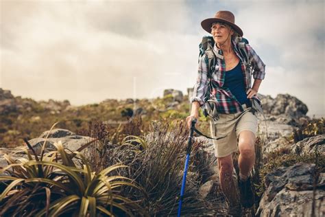 adventurous senior woman   hiking trip jacob lund photography store premium stock photo