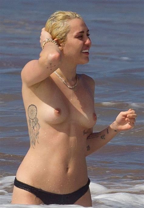 american singer songwriter and actress miley cyrus topless from hawaii