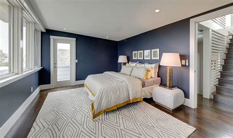 Aside From The Beautiful Navy Blue Walls This Bedroom Boasts An Tour