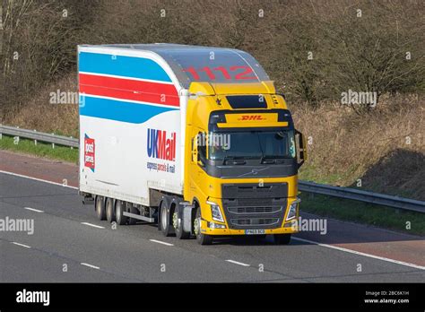dhl uk mail haulage delivery trucks lorry transportation truck cargo carrier volvo vehicle