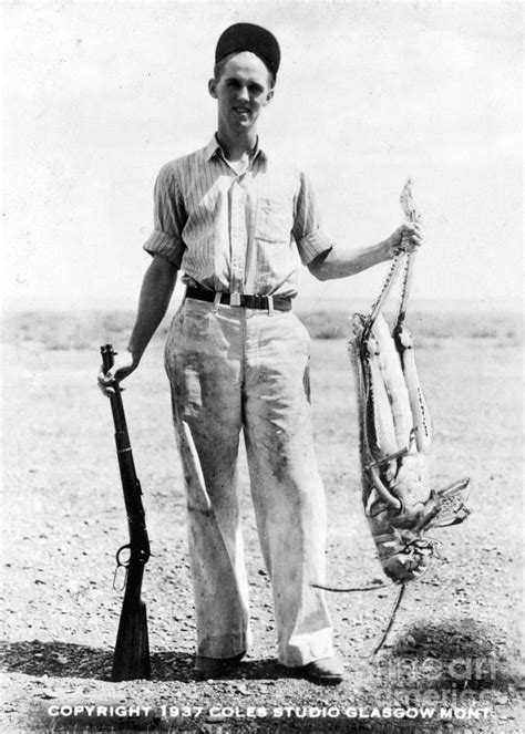 man holding giant grasshopper  bettmann