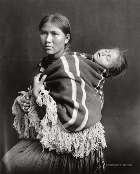 woman carrying sleeping child native american pictures native american