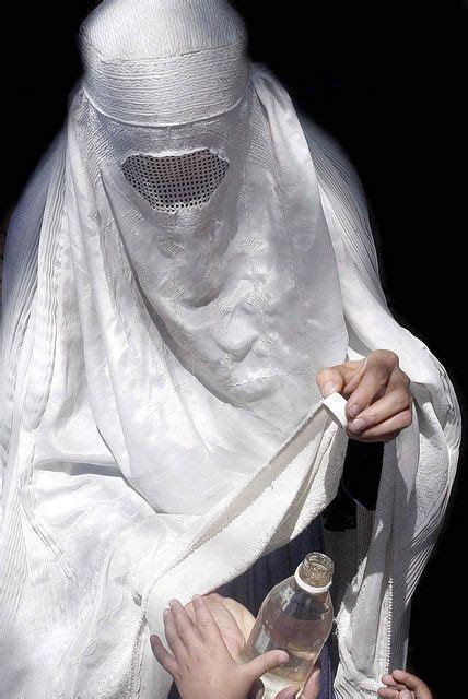 afghan woman wearing higab with nijab a niqab veil or mask also called a ruband is a