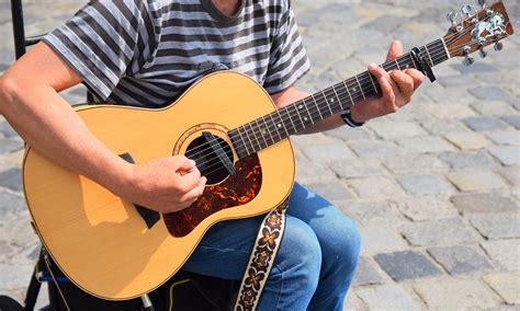 photo  person playing acoustic guitar  stock photo
