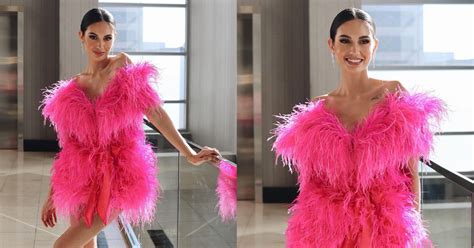 Celeste Cortesi Stuns In Pink Feather Dress Ahead Of Miss Universe