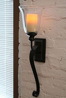 rubbed oil bronze battery operated iron scroll sconce