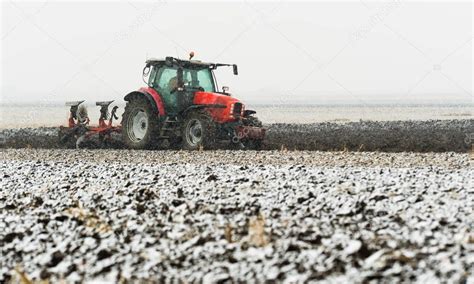 tractor plowing field winter stock photo ad field plowing tractor photo ad