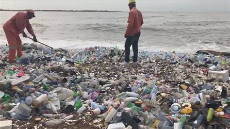 tons of garbage washes ashore onto dominican republic beach youtube