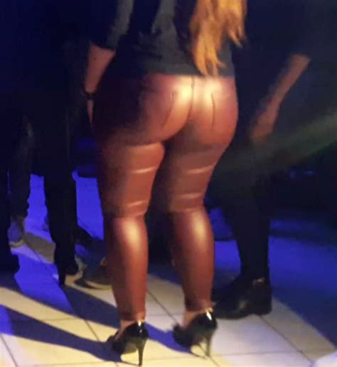 round ass of french girl tight skinny leather pants