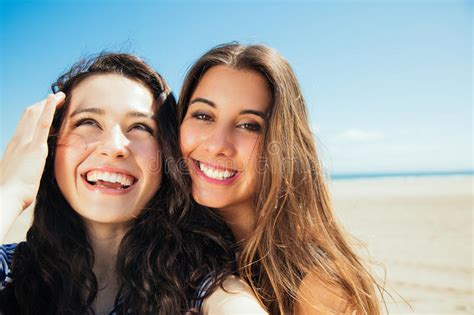 Funny Female Friends On Vacation Taking Selfies On The