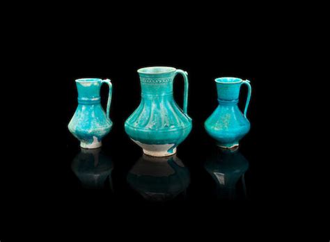 bonhams three moulded monochrome pottery jugs persia 12th century 3