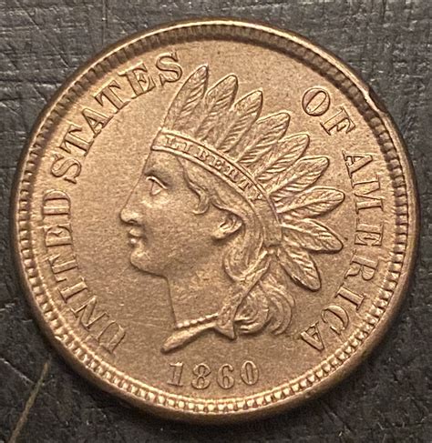 indian head rounded  pointed bust coin talk