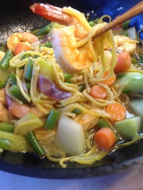 pancit canton chinese noodles stir fried with shrimps and vegetables