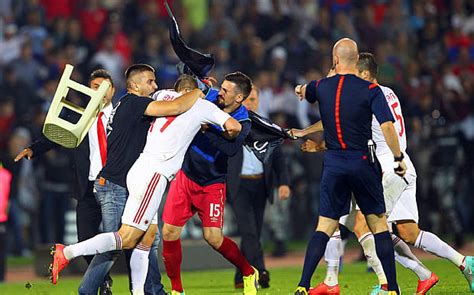 serbia  albania match abandoned  drone carrying albanian flag triggers massive brawl