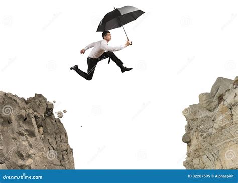 businessman jumping   mountains stock image image