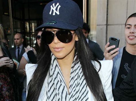 kim kardashian jumps on yankees bandwagon by donning team hat while out