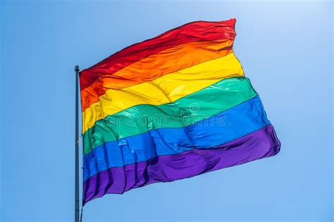 rainbow gay pride flag on the blue sky stock image image