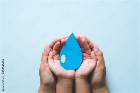hands holding clean water drop world water day concepts foto de stock