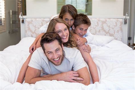 happy family   bed stock image image  homey father