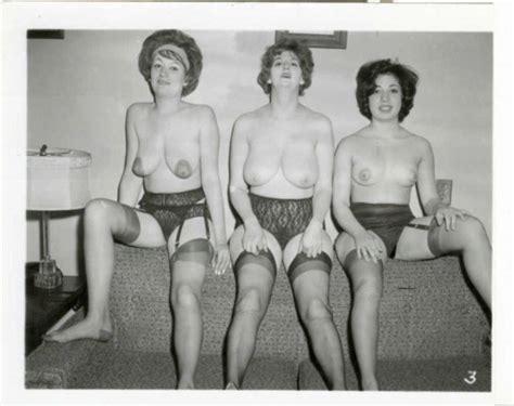 Three Vintage Wives Are Topless On The Sofa