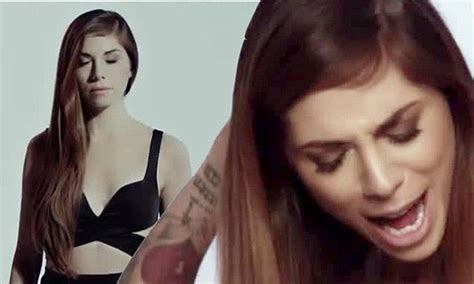 christina perry covers up tattoos to play robot in human music video