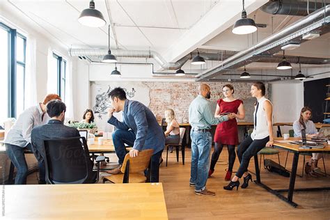 coworking groups  young people working   bright office  stocksy contributor