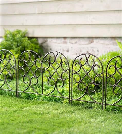Wrought Iron Edging Is A Pretty And Practical Addition To Your Garden