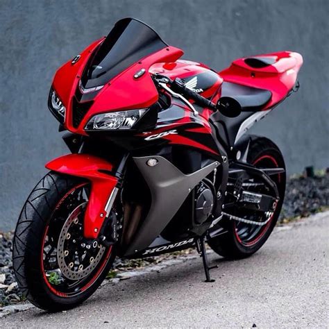 red  black honda cbr rr motorcycle