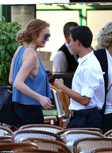 lindsay lohan braless in halter neck top for lunch date in monaco daily mail online