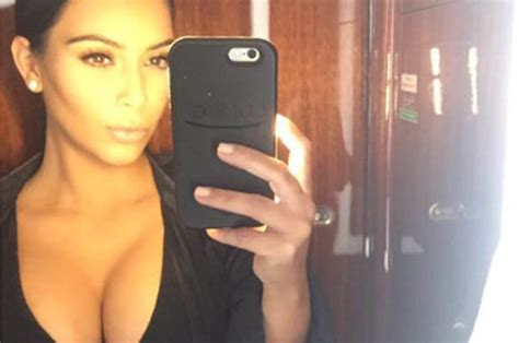 kim kardashian flashes cleavage in mile high selfie daily star