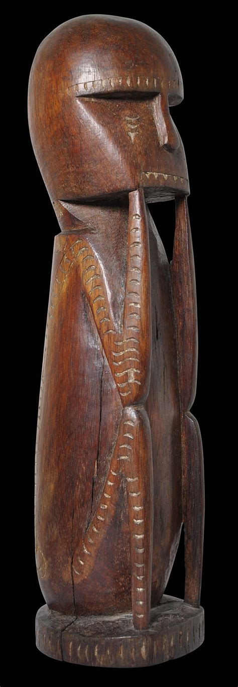 Carved Seated Massim Protective Figure With Lime Inlay Michael