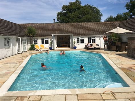 5 star holiday cottage near brighton swimming pool games