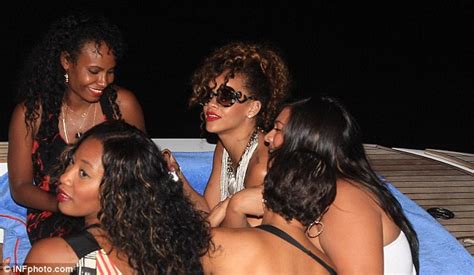 rihanna shrugs off sex tape rumours as she enjoys a girls night out