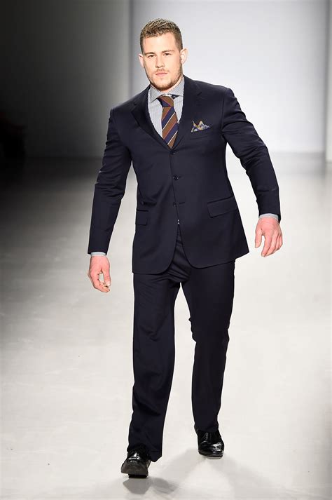 male amputee model walks at new york fashion week