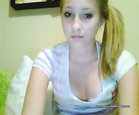 hot blonde teen strips naked and enjoys masturbating on webcam