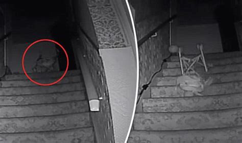 black monk filmed pushing pushchair down stairs by ghost hunters