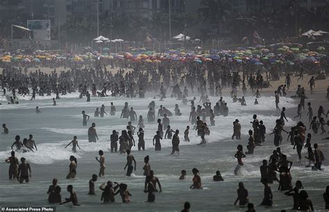 Thousands Pack On To Beaches In Rio De Janeiro With Few
