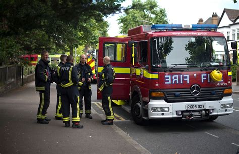 uk weather taxi cab bursts  flames  london firefighters tackle