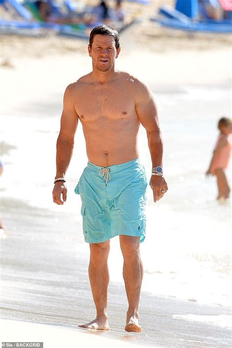mark wahlberg shows off his hunky shirtless physique in a