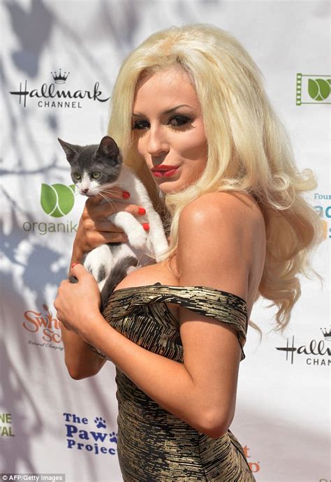 courtney stodden puts her ample cleavage on display alongside husband doug hutchison at the